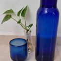 botella-de-vidrio-azul-con-tapa-alimentos-y-bebidas-gavese